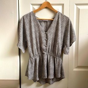 Cute day to night short sleeve blouse. V neck, peplum. Lightweight